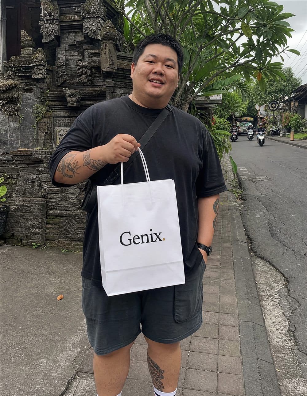 A Genix customer in Bali receiving their sealed delivery parcel